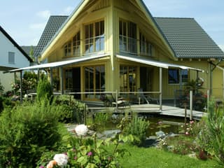 Fertighaus Kranich von Stommel Haus Schlüsselfertig ab 278000€, Blockhaus Außenansicht 11