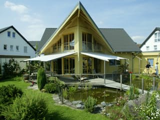 Fertighaus Kranich von Stommel Haus Schlüsselfertig ab 278000€, Blockhaus Außenansicht 12