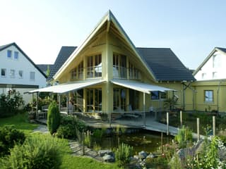 Fertighaus Kranich von Stommel Haus Schlüsselfertig ab 278000€, Blockhaus Außenansicht 18