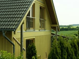 Fertighaus Kranich von Stommel Haus Schlüsselfertig ab 278000€, Blockhaus Außenansicht 3