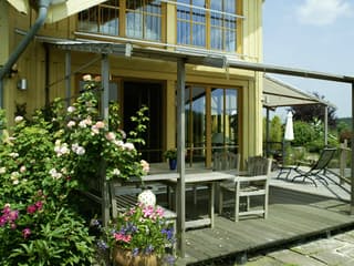 Fertighaus Kranich von Stommel Haus Schlüsselfertig ab 278000€, Blockhaus Außenansicht 8