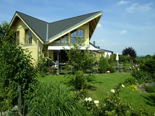 Fertighaus Kranich von Stommel Haus Schlüsselfertig ab 278000€, Blockhaus Außenansicht 9