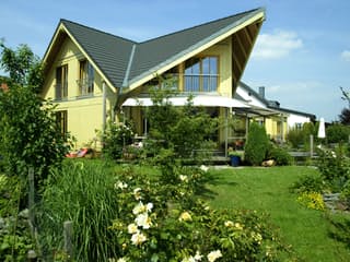 Fertighaus Kranich von Stommel Haus Schlüsselfertig ab 278000€, Blockhaus Außenansicht 1