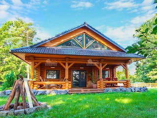 Blockhaus Elch von LéonWood® Holz-Blockhaus Bausatzhaus ab 114900€, Blockhaus Außenansicht 1
