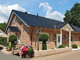 Massivhaus Ipsen von Mammen Bauunternehmen, Bungalow Außenansicht 1