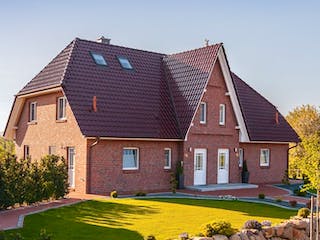Massivhaus Duo Friesenhaus 130 von ECO System HAUS, Satteldach-Klassiker Außenansicht 1