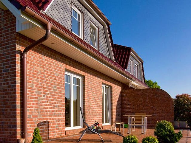 Massivhaus Duo Friesenhaus 130 von ECO System HAUS Schlüsselfertig ab 294500€, Satteldach-Klassiker Außenansicht 3
