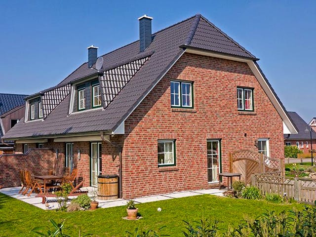Massivhaus Duo Friesenhaus 130 von ECO System HAUS Schlüsselfertig ab 294500€, Satteldach-Klassiker Außenansicht 4