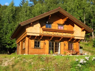 Fertighaus Murau von Holzhaus Roßkopf Schlüsselfertig ab 226800€, Blockhaus Außenansicht 2