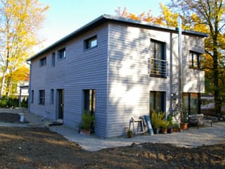 Fertighaus Nimrod von Holzhaus Rosskopf Schlüsselfertig ab 598000€, Pultdachhaus Außenansicht 2