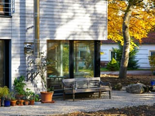 Fertighaus Nimrod von Holzhaus Rosskopf Schlüsselfertig ab 598000€, Pultdachhaus Außenansicht 8