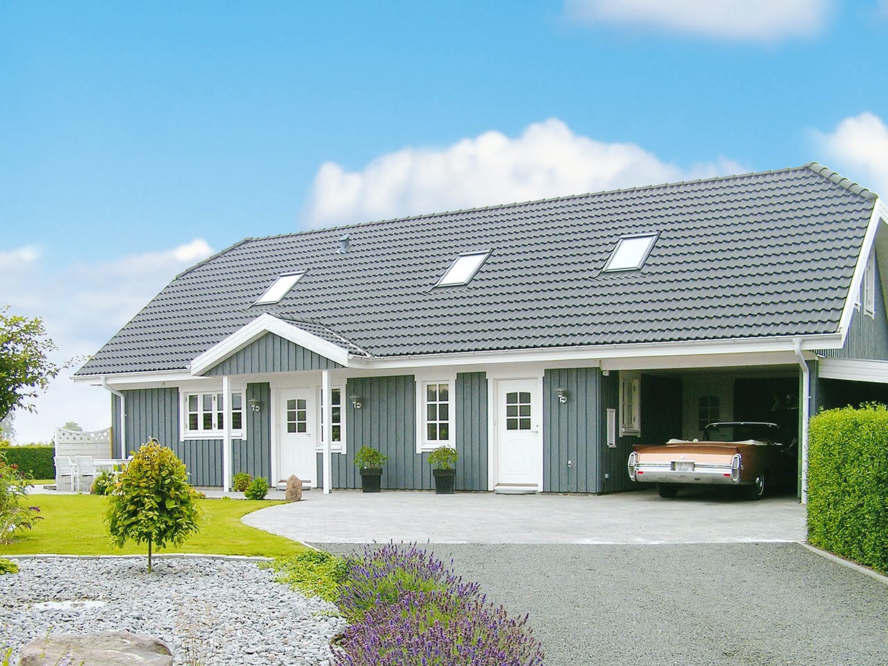 Fertighaus Oslo - Holzhaus im skandinavischen Stil von Danhaus Deutschland, Satteldach-Klassiker Außenansicht 1