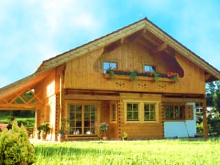 Fertighaus Pinzgau von TIROLIA Ausbauhaus ab 116850€, Blockhaus Außenansicht 1