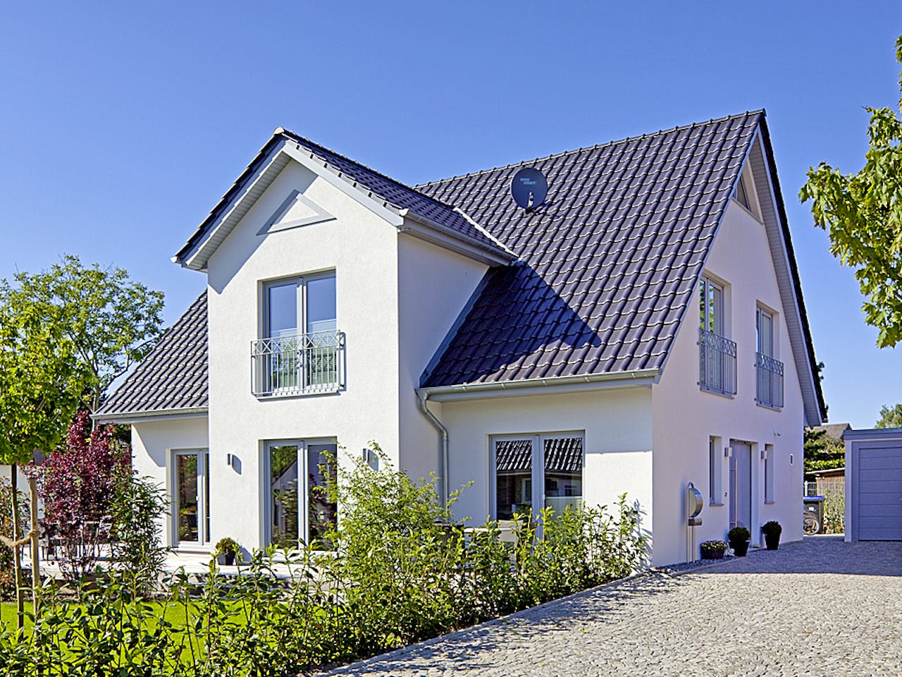 Massivhaus Behringer von Plan-Concept Massivhaus, Satteldach-Klassiker Außenansicht 1