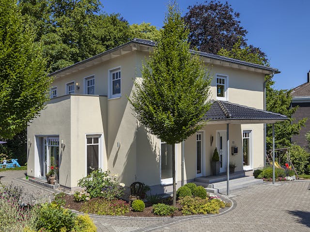 Massivhaus Conrad von Plan-Concept Massivhaus, Stadtvilla Außenansicht 2