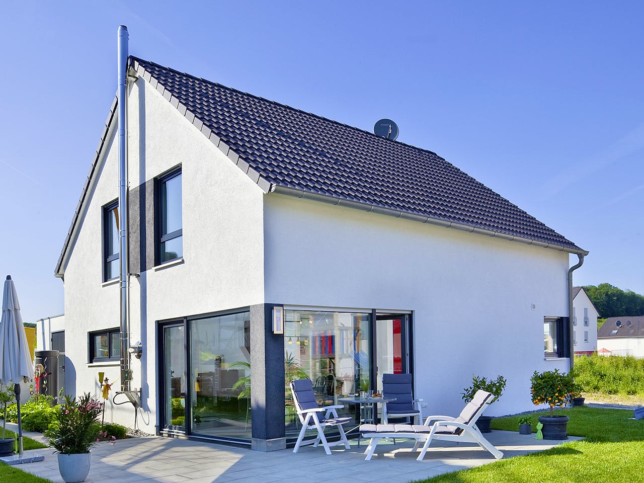 Massivhaus Escher von Plan-Concept Massivhaus, Satteldach-Klassiker Außenansicht 1