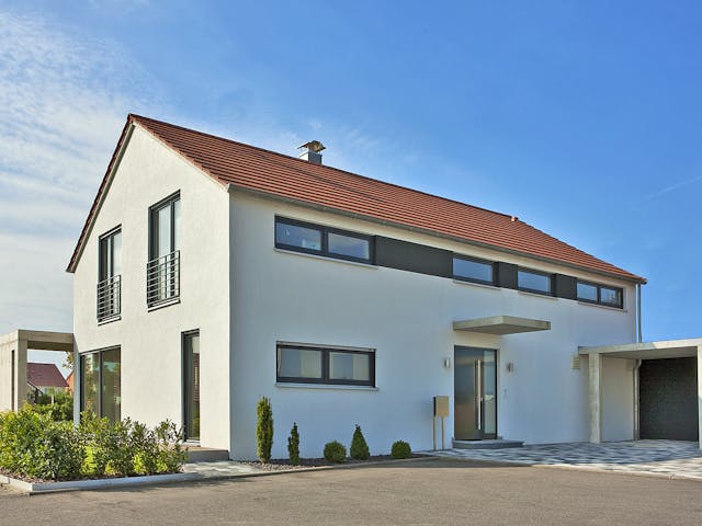 Massivhaus Zöllner von Plan-Concept Massivhaus, Satteldach-Klassiker Außenansicht 2