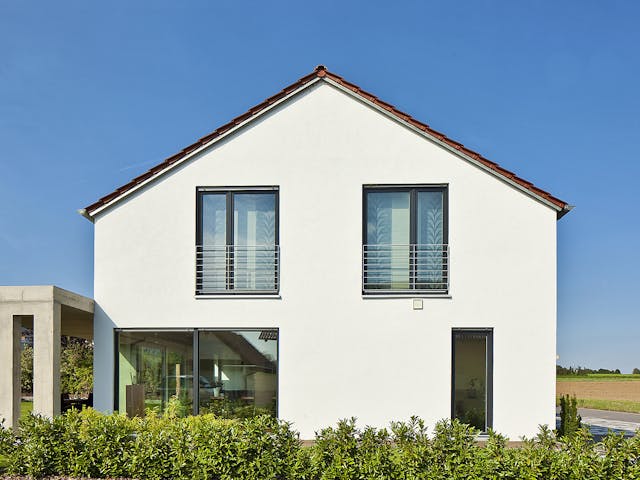 Massivhaus Zöllner von Plan-Concept Massivhaus, Satteldach-Klassiker Außenansicht 3