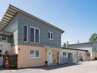 Fertighaus Raubling 1 von Regnauer Hausbau Schlüsselfertig ab 246855€, Pultdachhaus Außenansicht 1