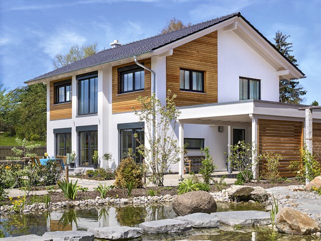 Fertighaus Glonn von Regnauer Hausbau Schlüsselfertig ab 498590€, Satteldach-Klassiker Außenansicht 2