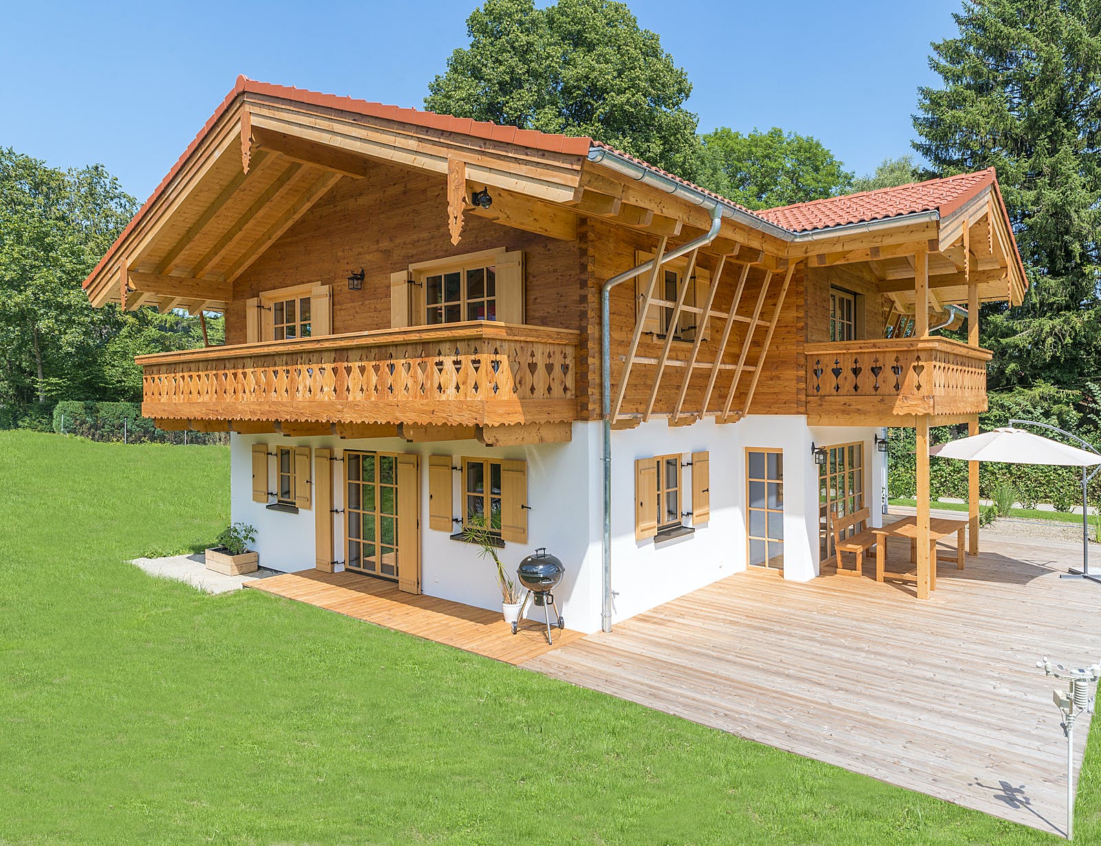 Blockhaus Chiemsee von Rems-Murr-Holzhaus Schlüsselfertig ab 590000€, Blockhaus Außenansicht 1