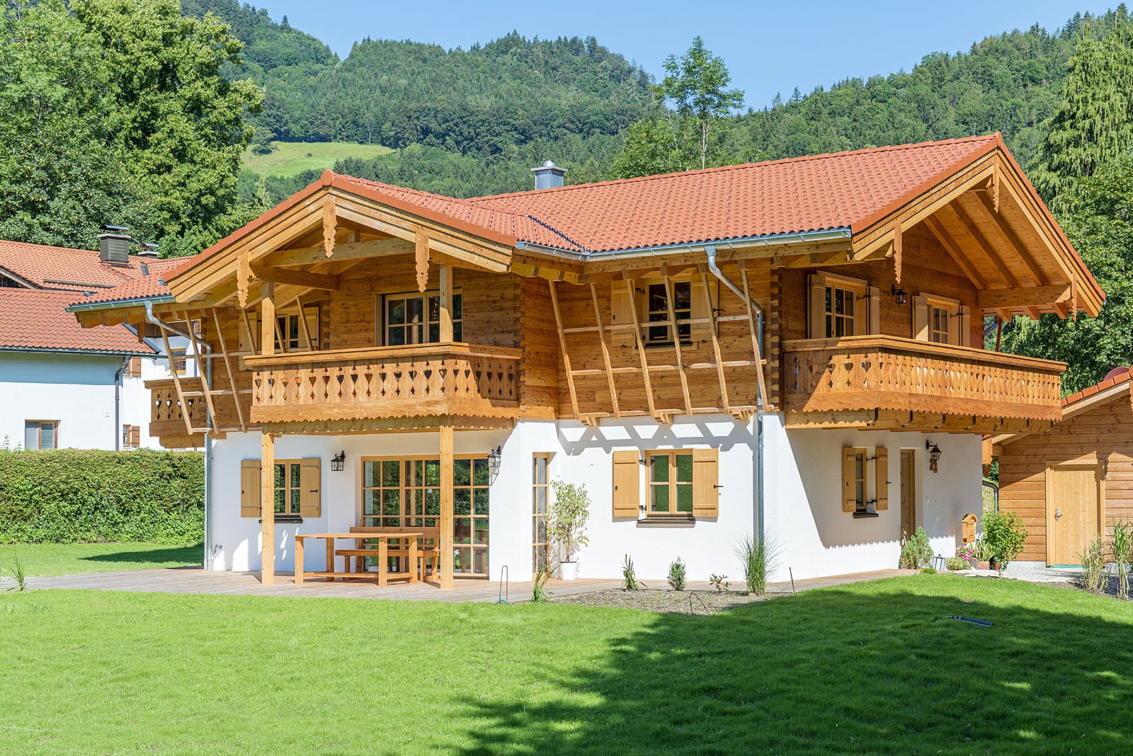 Blockhaus Chiemsee von Rems-Murr-Holzhaus Schlüsselfertig ab 590000€, Blockhaus Außenansicht 2
