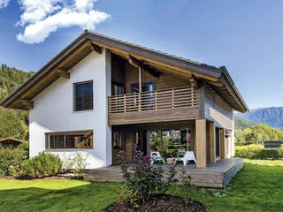 Blockhaus Pusteria von Rubner Haus AT Schlüsselfertig ab 380000€, Blockhaus Außenansicht 1