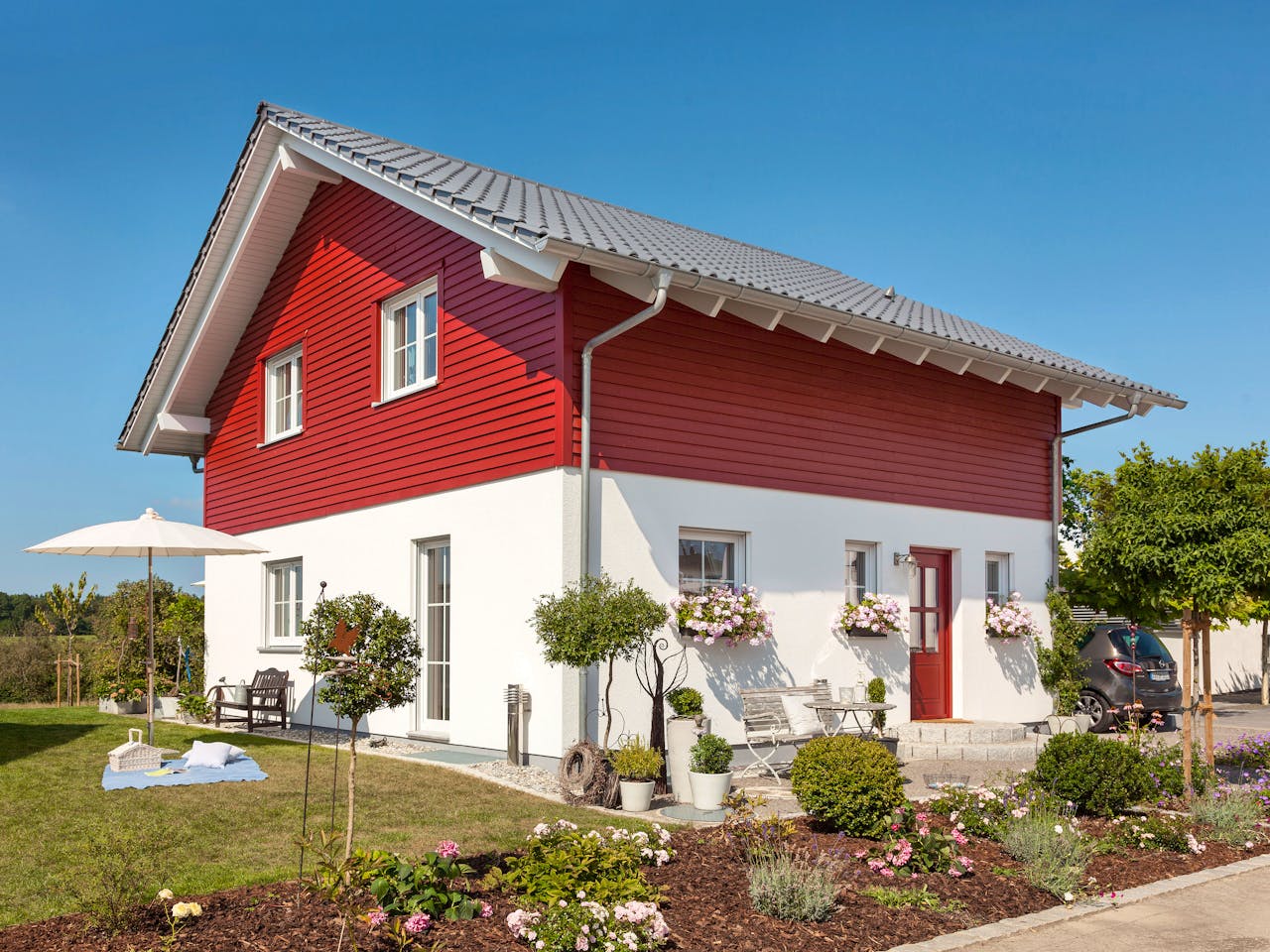 Fertighaus E 15-128.8 - Modernes Landhaus von SchwörerHaus Schlüsselfertig ab 332211€, Satteldach-Klassiker Außenansicht 1