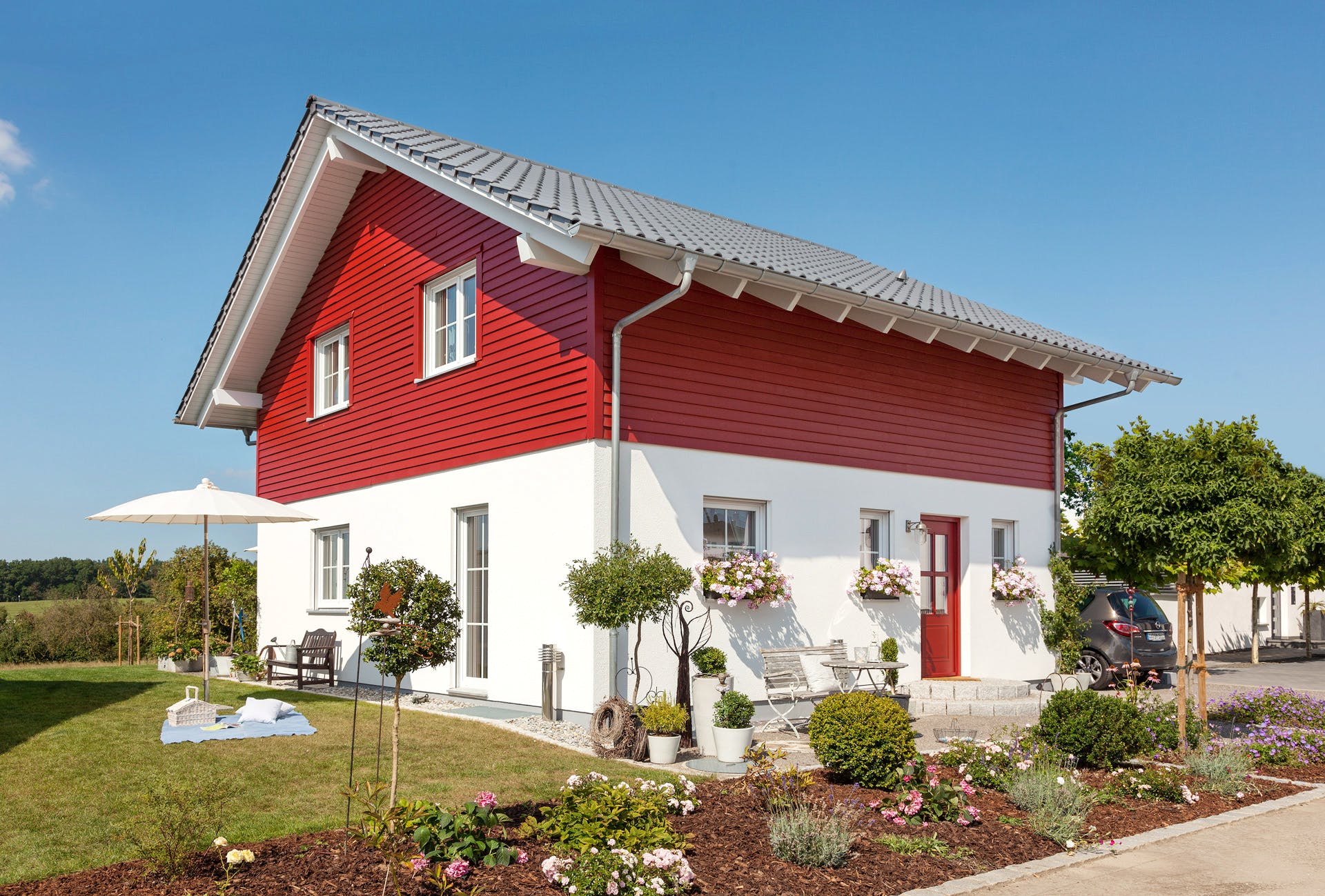 Fertighaus E 15-128.8 - Modernes Landhaus von SchwörerHaus Schlüsselfertig ab 315700€, Satteldach-Klassiker Außenansicht 1