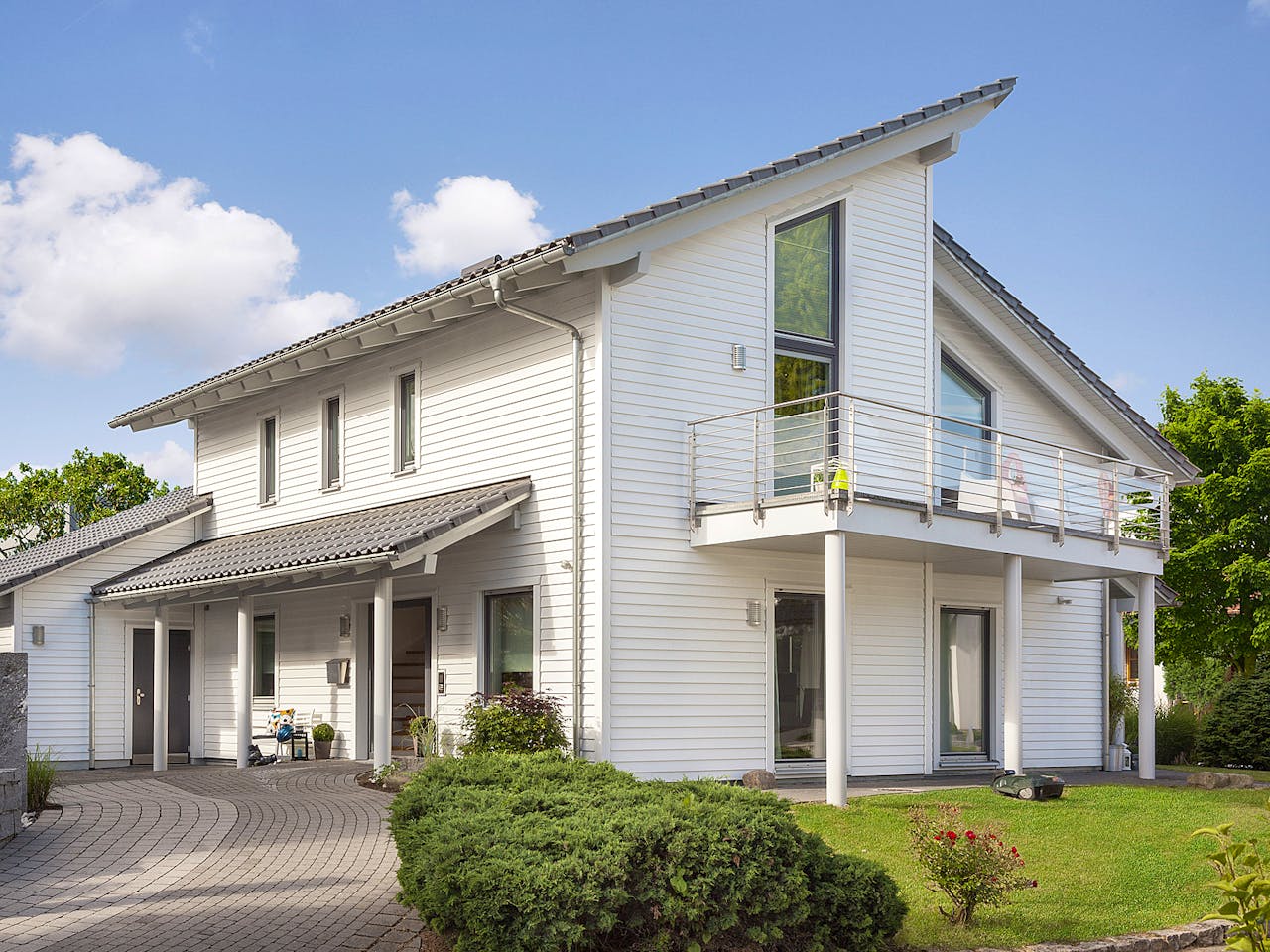 Fertighaus E 15-146.3 - Young Family Home 1 von SchwörerHaus Schlüsselfertig ab 474050€, Pultdachhaus Außenansicht 1