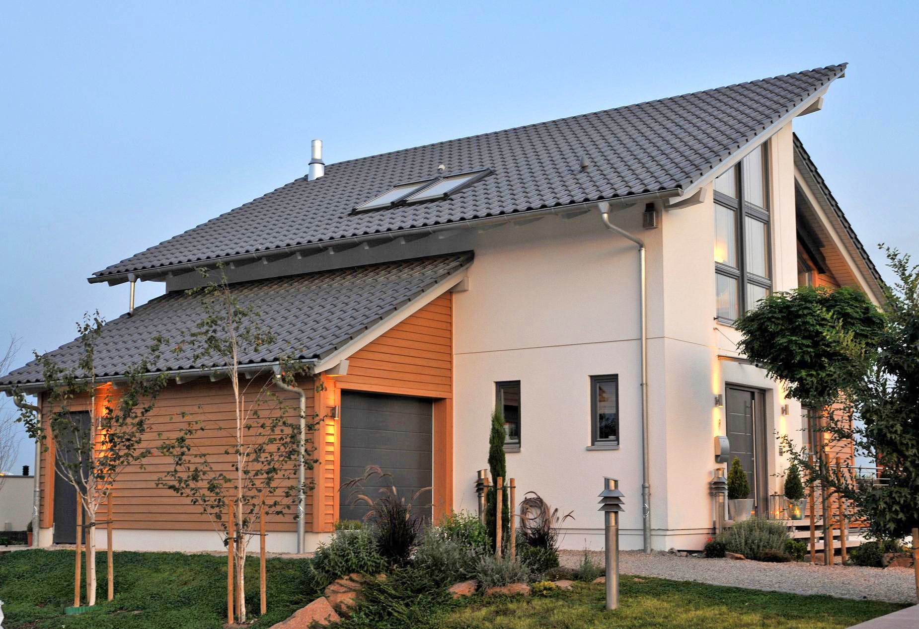 Fertighaus E 15-154.1 - Fertighaus mit Holz von SchwörerHaus Schlüsselfertig ab 439650€, Pultdachhaus Außenansicht 2