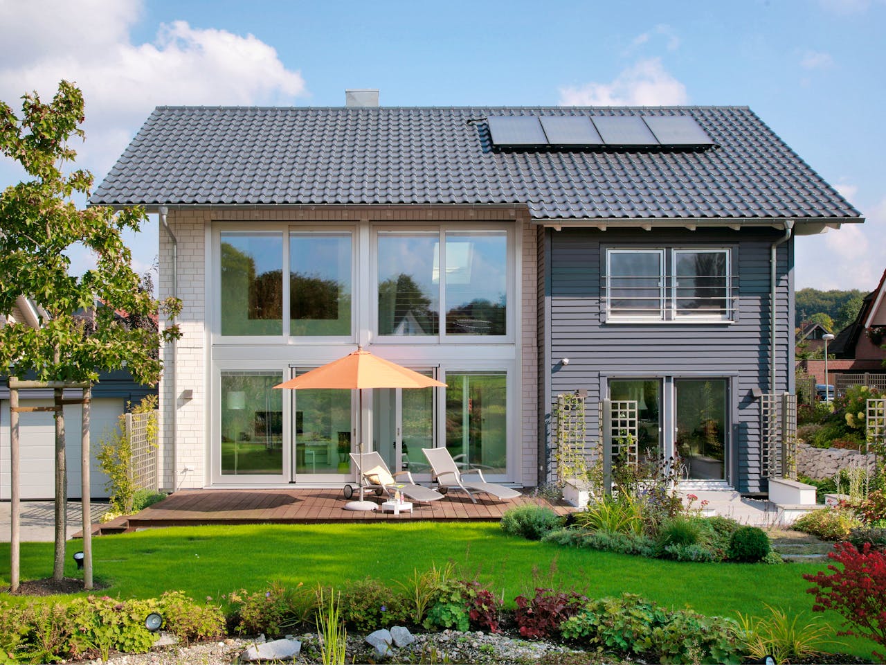 Fertighaus E 15-197.2 - Fertighaus mit Klinkerfassade von SchwörerHaus Schlüsselfertig ab 568042€, Außenansicht 1