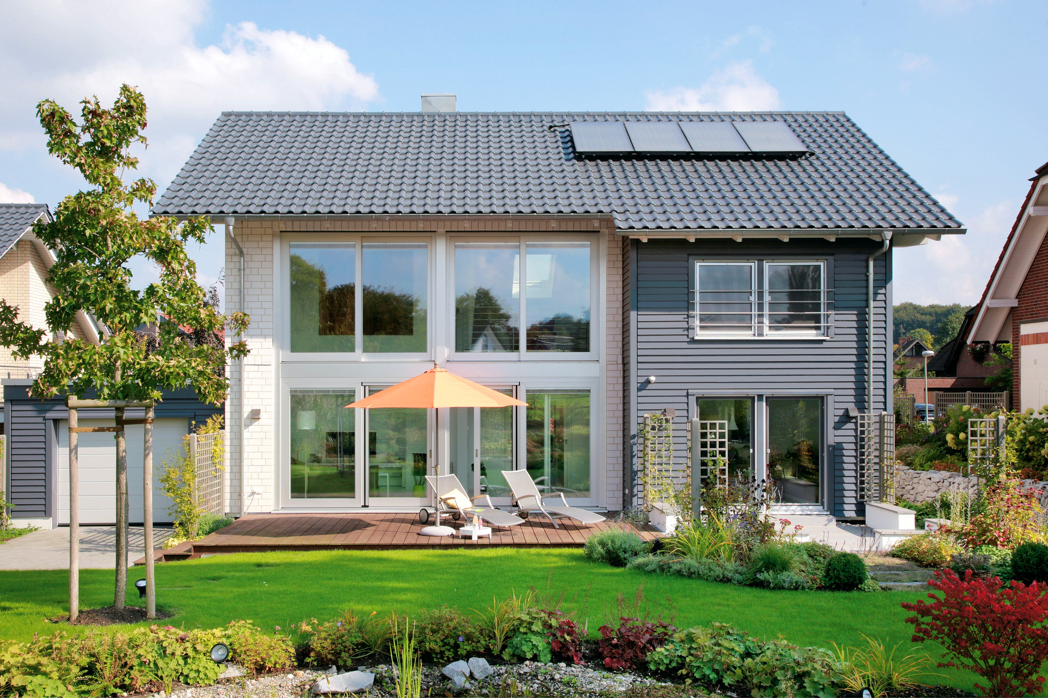 Fertighaus E 15-197.2 - Fertighaus mit Klinkerfassade von SchwörerHaus Schlüsselfertig ab 559600€, Außenansicht 1