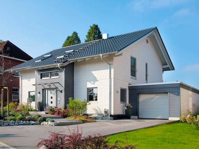 Fertighaus E 15-197.2 - Fertighaus mit Klinkerfassade von SchwörerHaus Schlüsselfertig ab 568042€, Außenansicht 2