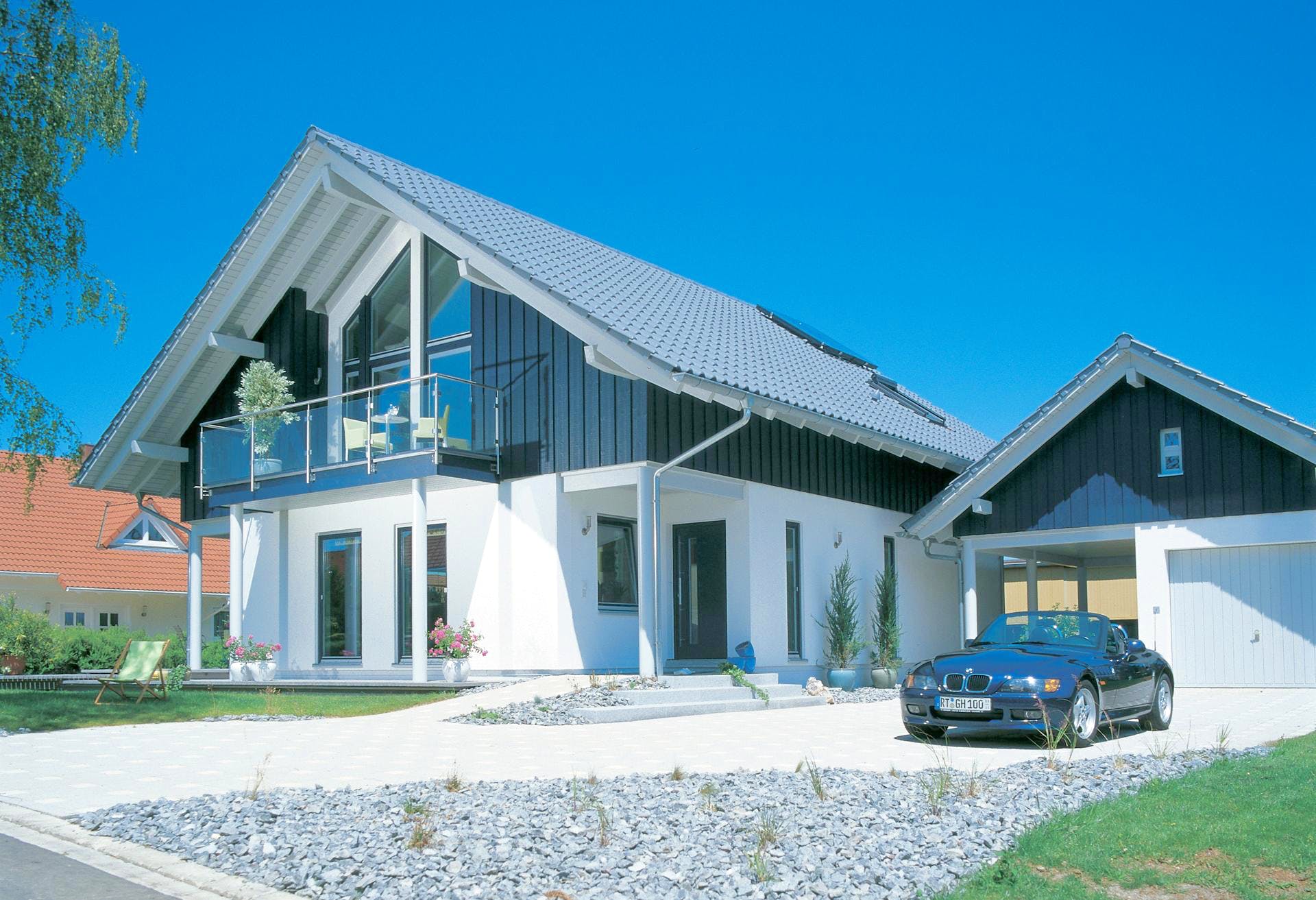 Fertighaus E 15-205.1 - Haus mit Wintergarten von SchwörerHaus Schlüsselfertig ab 566550€, Außenansicht 2