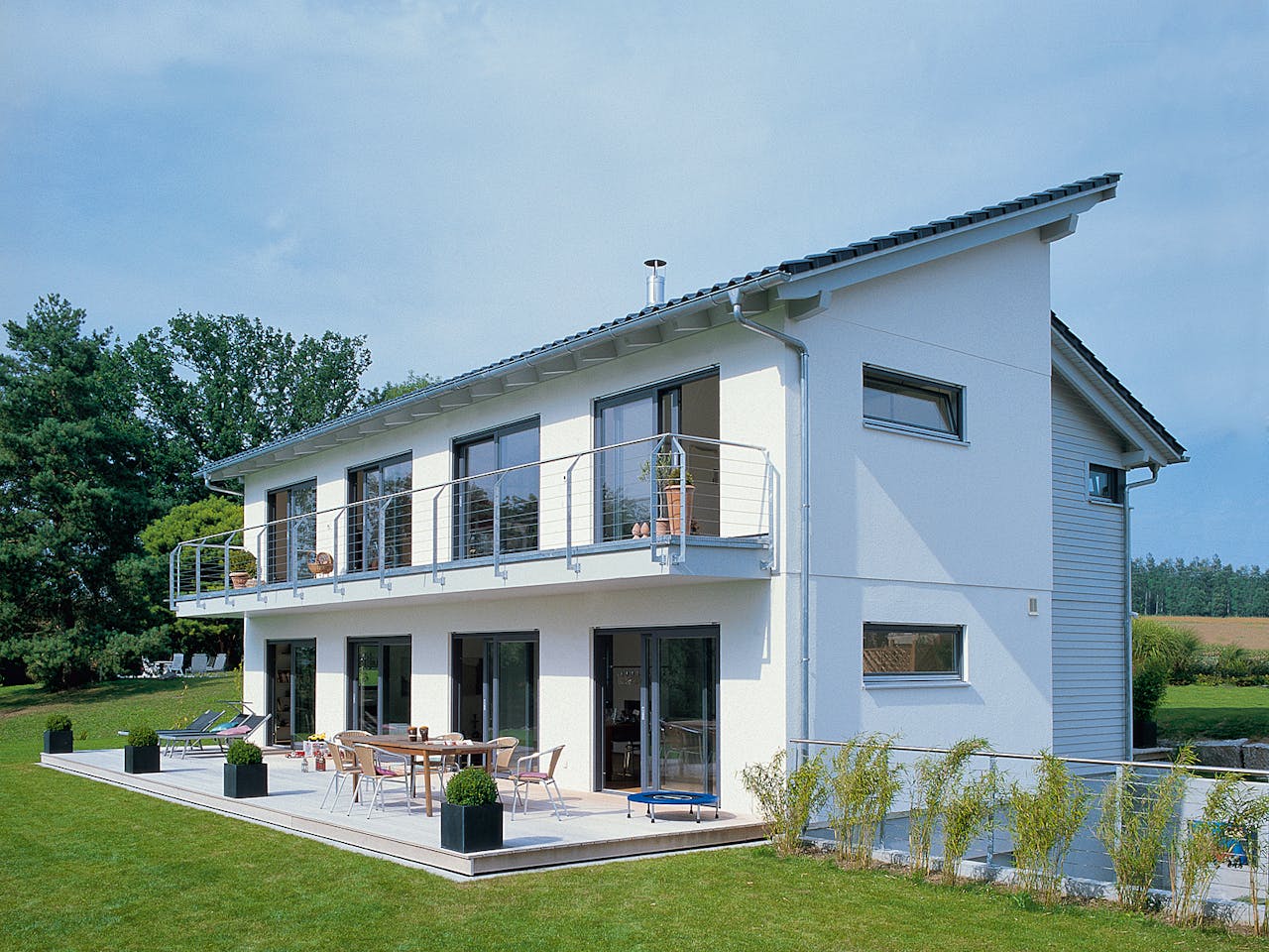 Fertighaus E 15-217.1 - Fertighaus mit 200 qm von SchwörerHaus Schlüsselfertig ab 630242€, Pultdachhaus Außenansicht 1