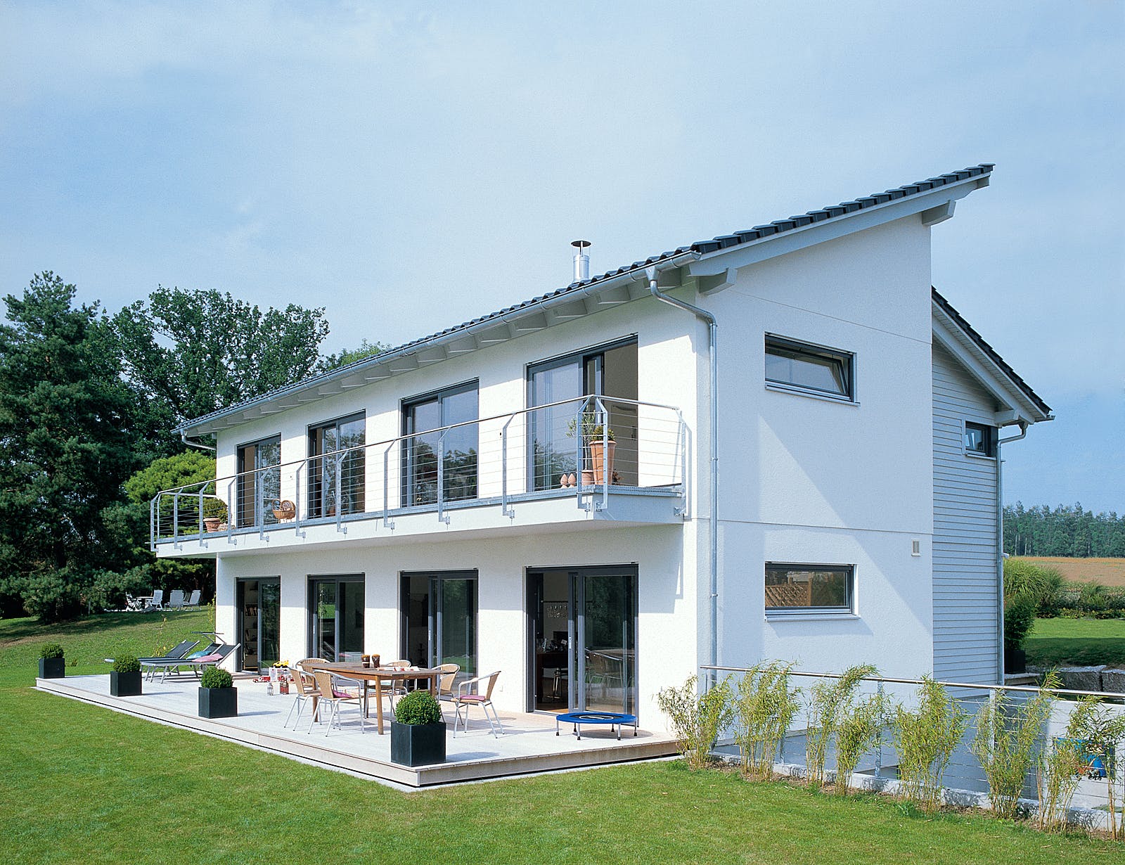 Fertighaus E 15-217.1 - Fertighaus mit 200 qm von SchwörerHaus Schlüsselfertig ab 616000€, Pultdachhaus Außenansicht 1