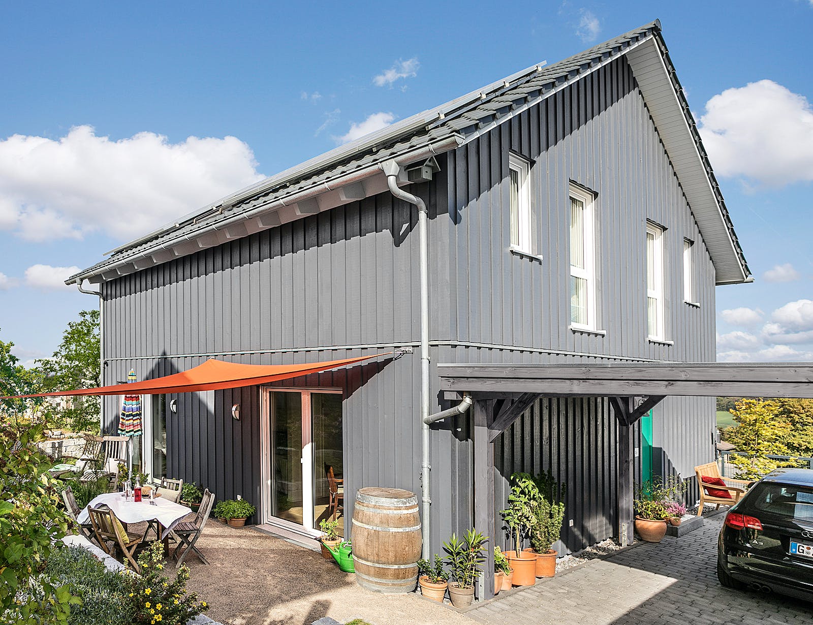 Fertighaus E15-150.5 - Im Bergischen Stil von SchwörerHaus Schlüsselfertig ab 381850€, Satteldach-Klassiker Außenansicht 2