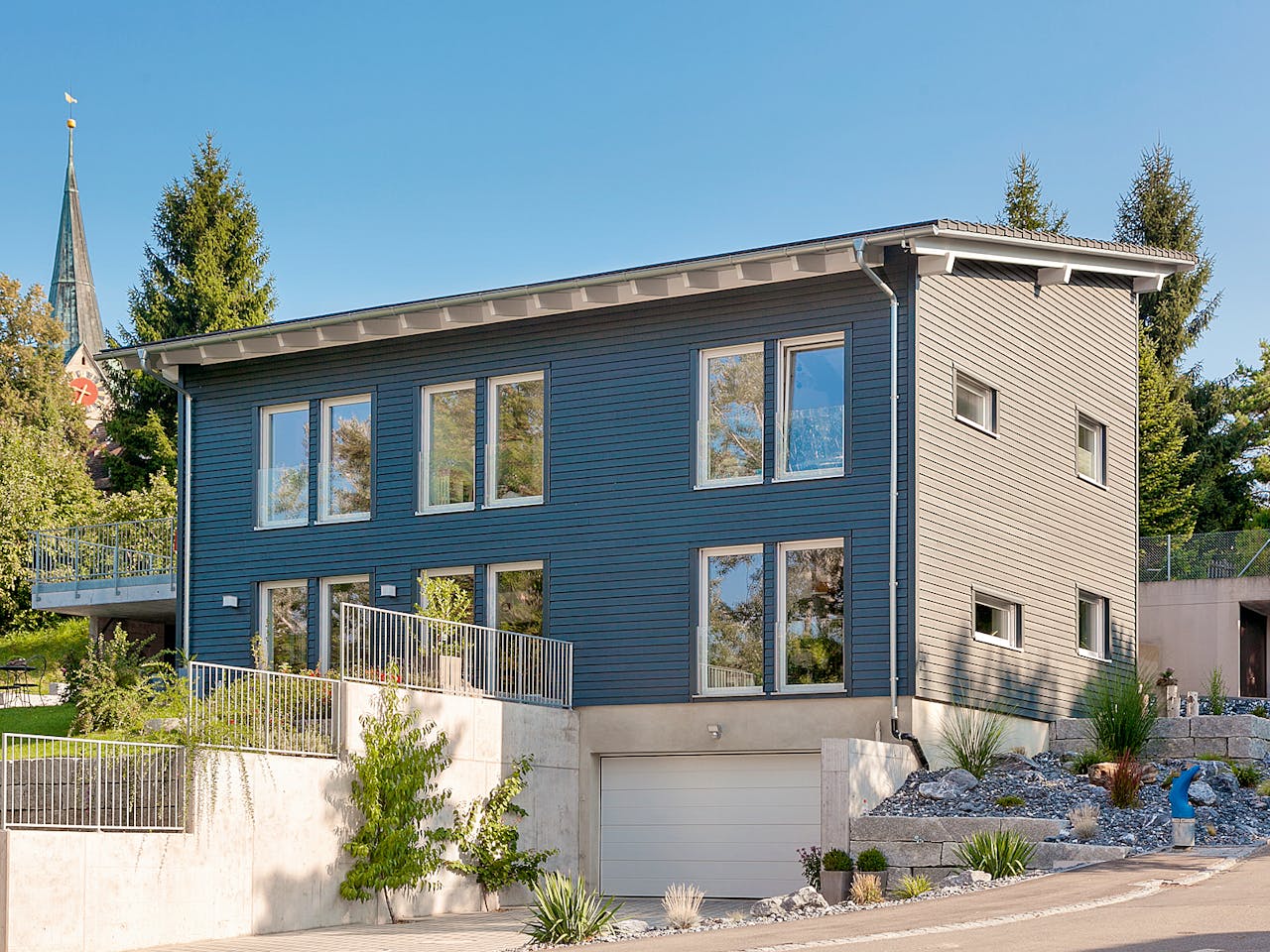 Fertighaus E 20-196.2 - Energiesparhaus von SchwörerHaus Schlüsselfertig ab 571672€, Pultdachhaus Außenansicht 1