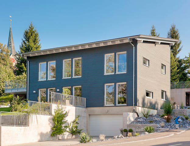 Bei diesem energiesparenden Fertighaus von SchwörerHaus sorgt die besondere Frischluft- & Lüftungstechnik für beste Voraussetzungen für Allergiker.