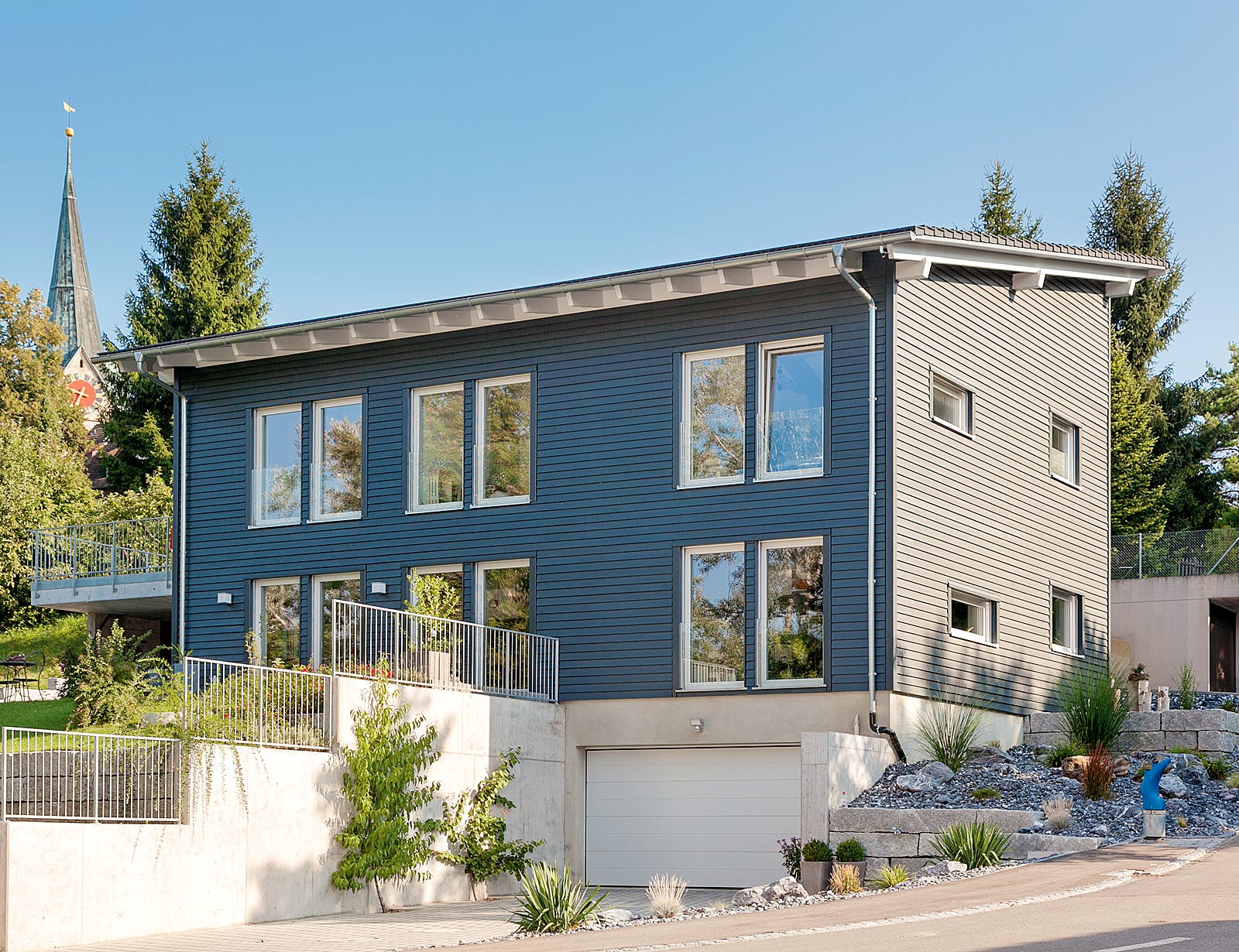 Fertighaus E 20-196.2 - Energiesparhaus von SchwörerHaus Schlüsselfertig ab 558850€, Pultdachhaus Außenansicht 1