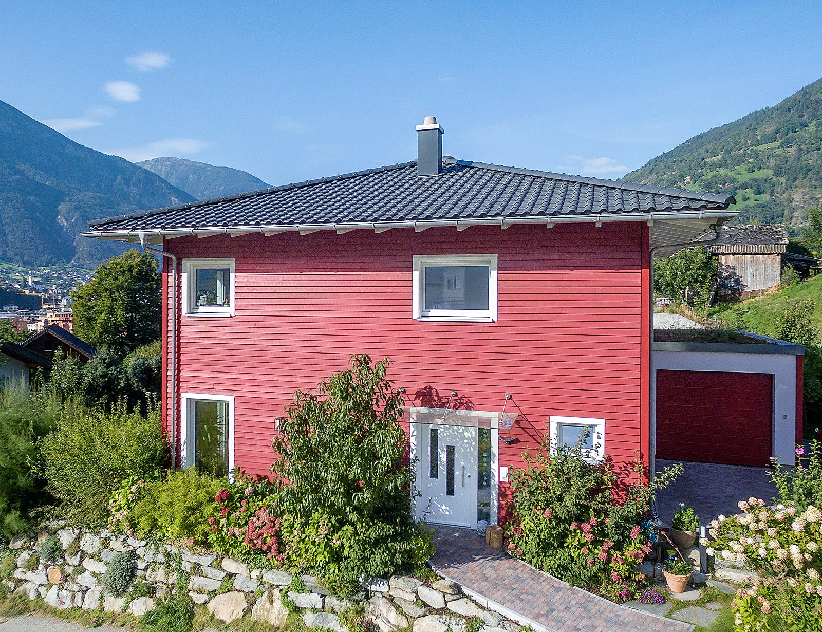 Fertighaus E 20-144.8 - Skandinavisches Holzhaus als Fertighaus von SchwörerHaus Schlüsselfertig ab 428700€, Außenansicht 1