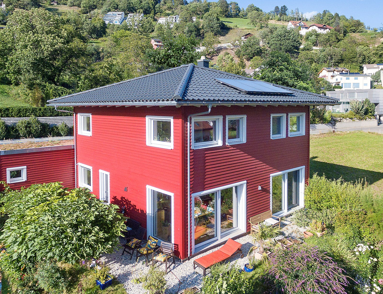 Fertighaus E 20-144.8 - Skandinavisches Holzhaus als Fertighaus von SchwörerHaus Schlüsselfertig ab 428700€, Außenansicht 2