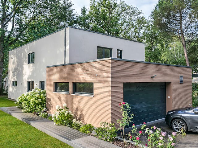 Fertighaus E 20-220.1 - Moderne Villa mit Flachdach von SchwörerHaus Schlüsselfertig ab 608464€, Cubushaus Außenansicht 3