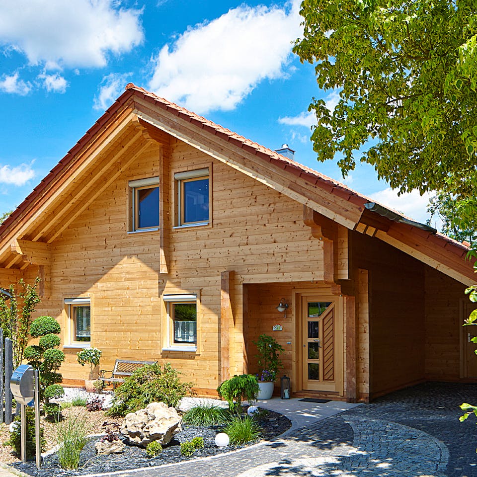 Blockhaus Siglingen von Rems-Murr-Holzhaus Ausbauhaus ab 274728€, Satteldach-Klassiker Außenansicht 2