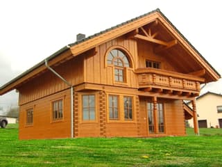 Fertighaus Spittal - Erkervariante von TIROLIA Ausbauhaus ab 119650€, Blockhaus Außenansicht 4