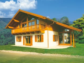 Fertighaus Tegernsee mit Wintergarten von ISARTALER HOLZHAUS Schlüsselfertig ab 366800€, Satteldach-Klassiker Außenansicht 1