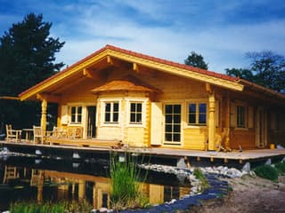 Fertighaus Variantenhaus von TIROLIA Ausbauhaus ab 103780€, Blockhaus Außenansicht 1