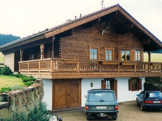 Fertighaus Variantenhaus von TIROLIA Ausbauhaus ab 103780€, Blockhaus Außenansicht 2