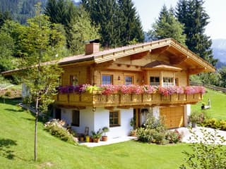 Fertighaus Variantenhaus von TIROLIA Ausbauhaus ab 103780€, Blockhaus Außenansicht 3